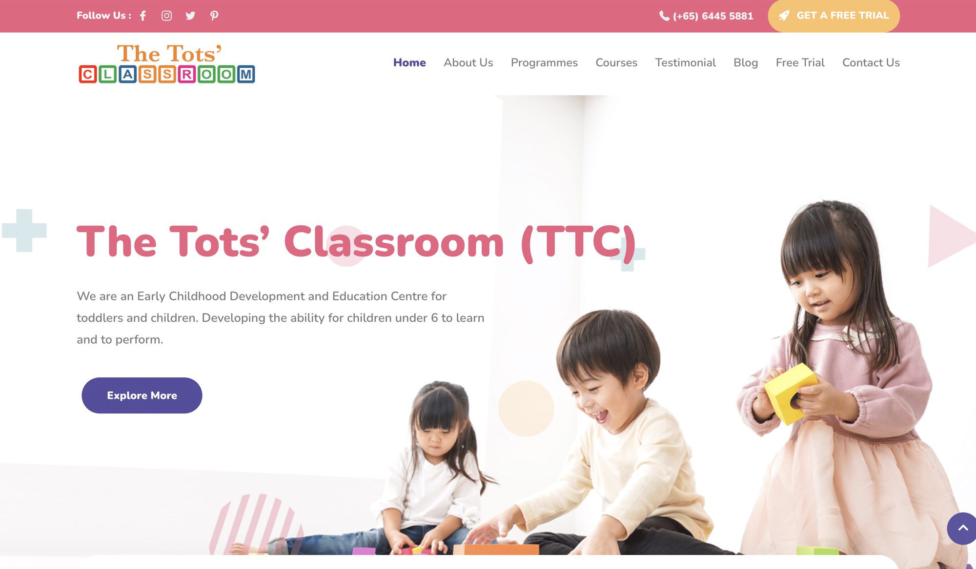 Children engaging with educational toys at The Tots' Classroom early learning center.