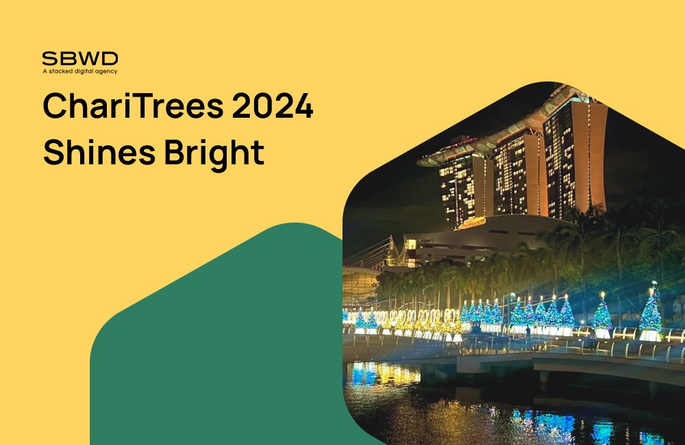 ChariTrees 2024 event highlights in vibrant Singapore nightscape.